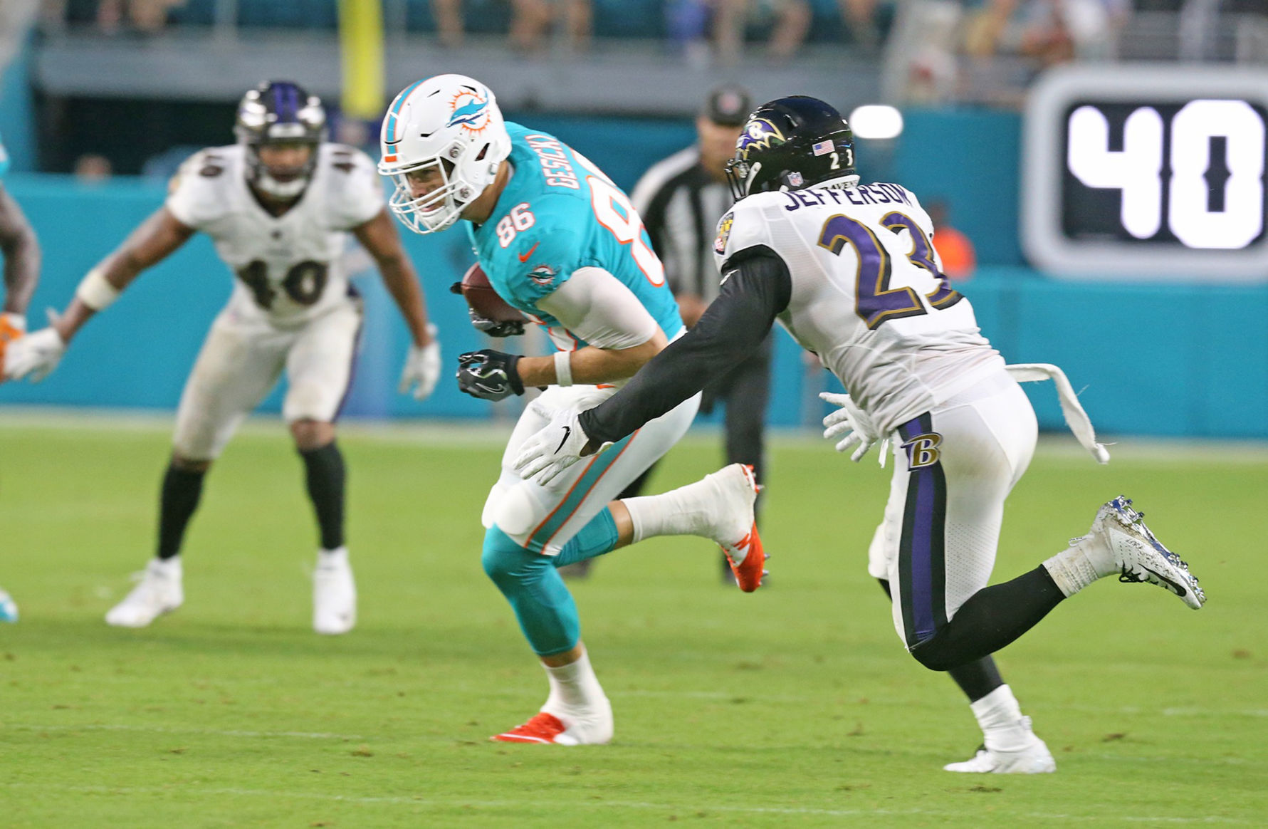 SPORTS-FBN-RAVENS-DOLPHINS-20-MI